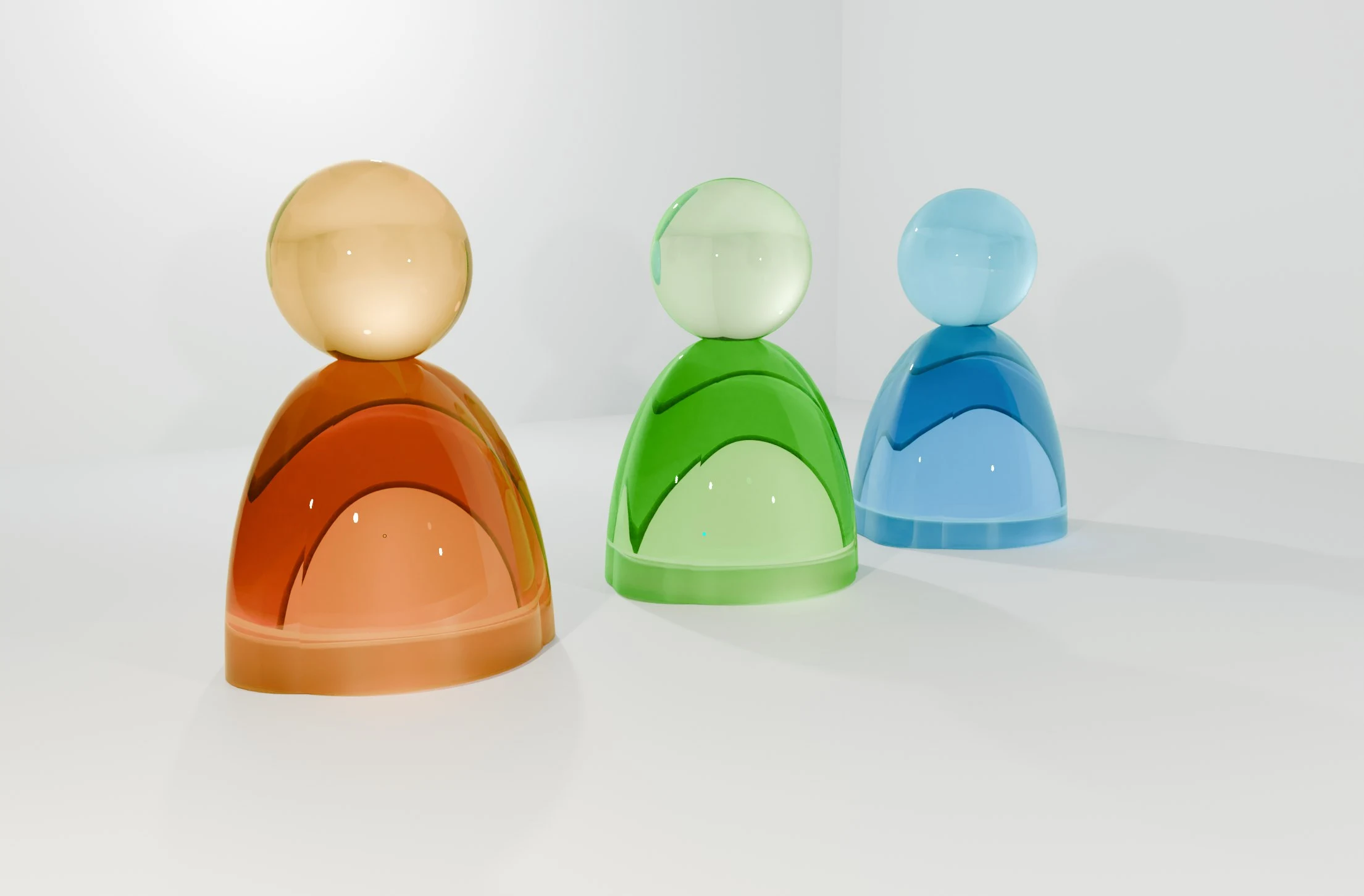 Three translucent person-shaped icons in amber, green and blue, standing on a pale surface with soft shadows.