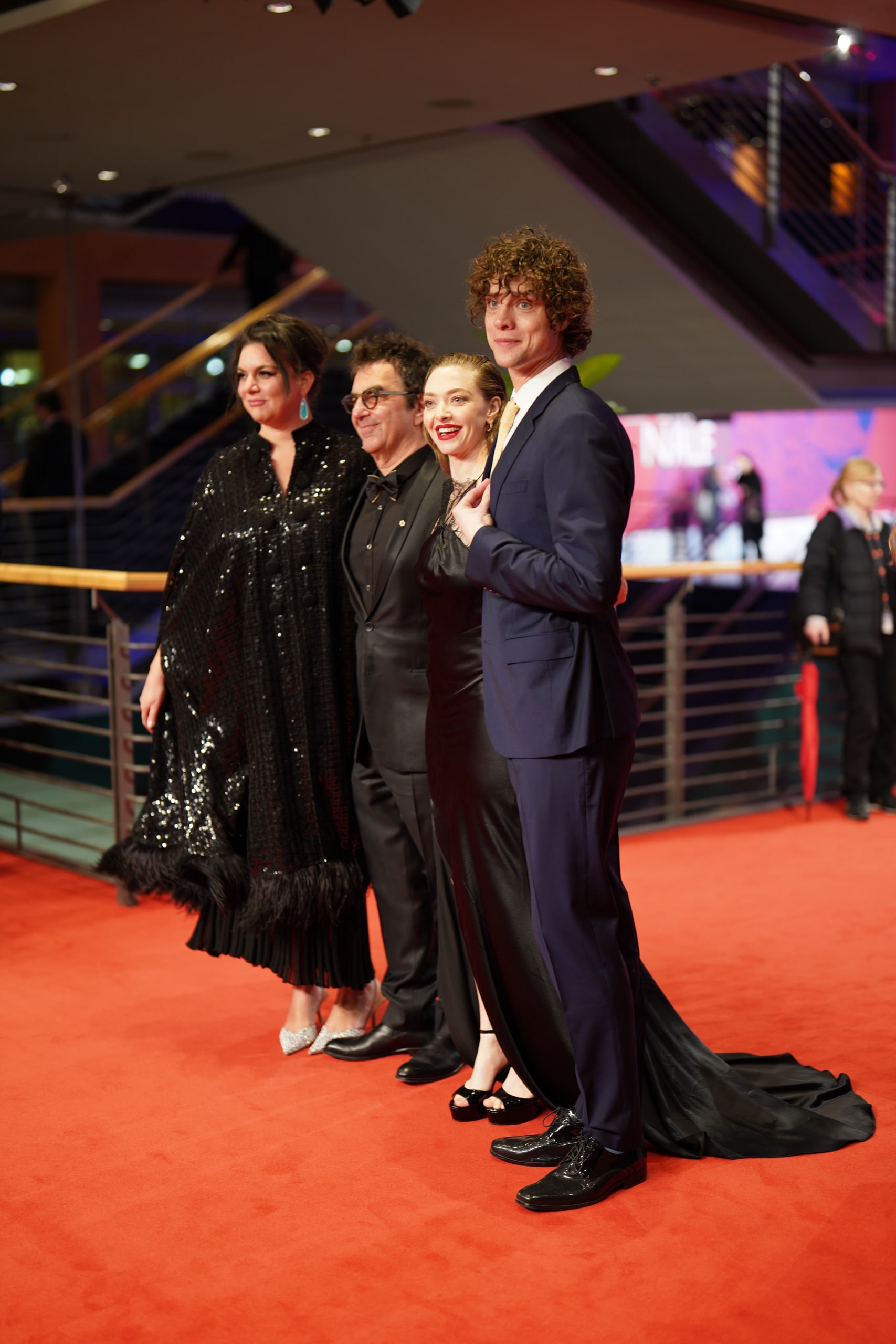 Four members of the Seven Veils team posing together on the Berlinale red carpet.